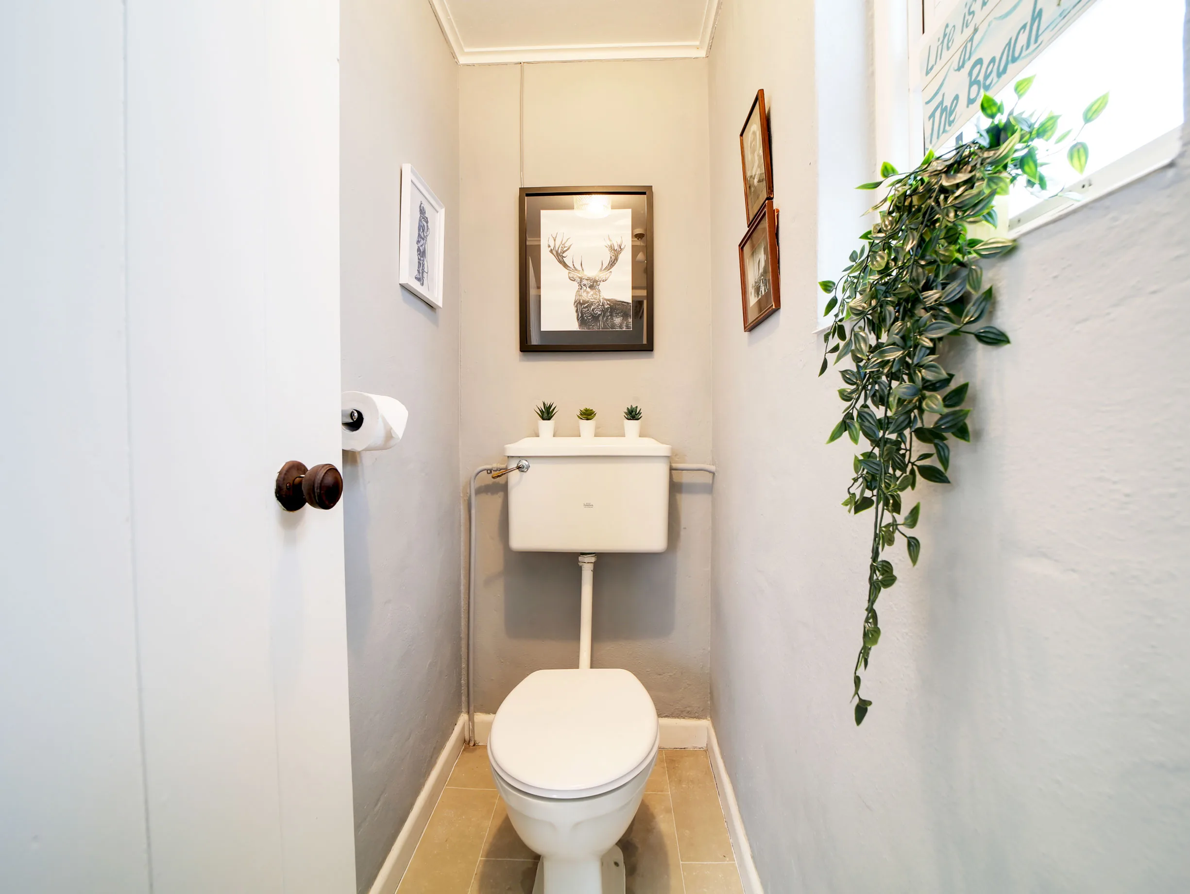 Small en-suite WC and basin upstairs at Little Avalon.
