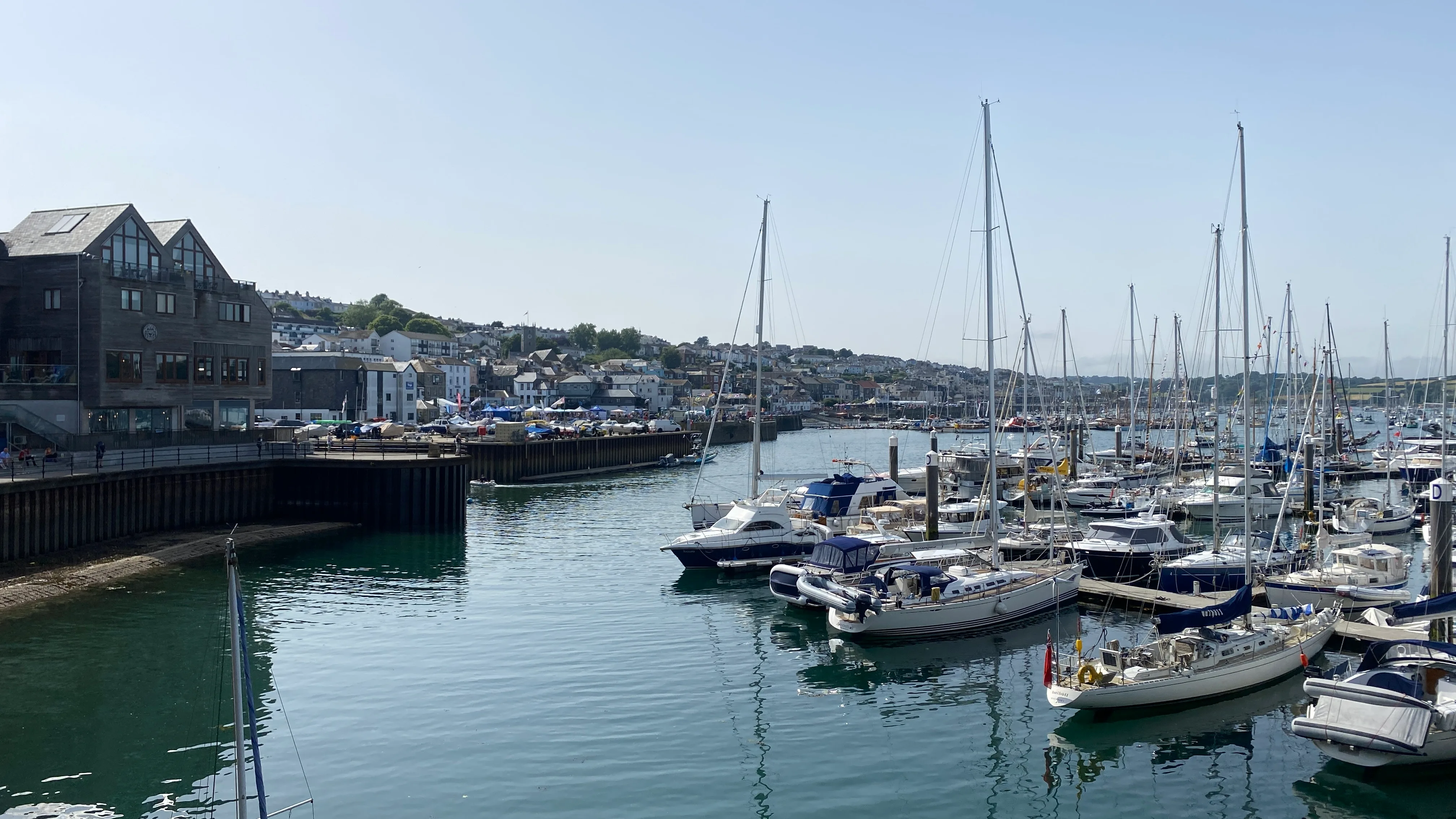 Falmouth harbour: fishing boats and yachts on the water, the docks beyond, ten minutes from Trewena.