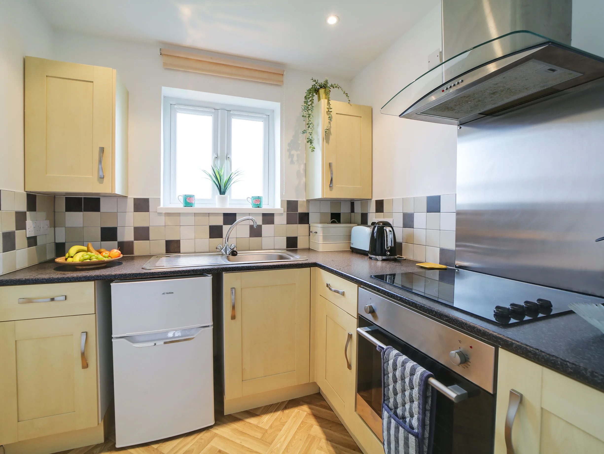The Pigsty's upstairs kitchen with countryside views.